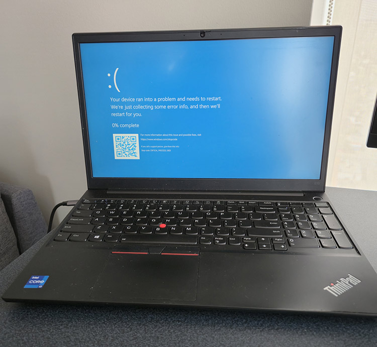 windows laptop with Blue Screen of Death (BSoD)