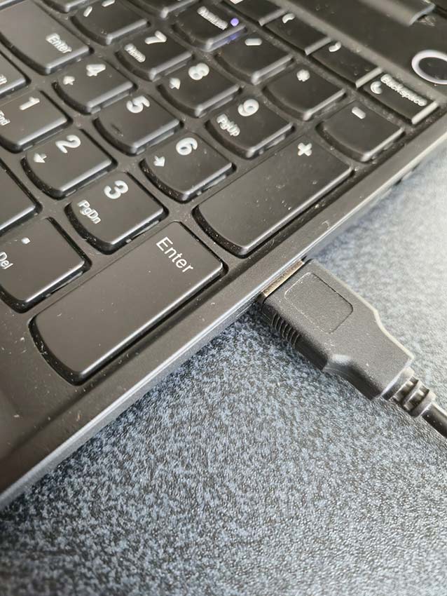 a USB device connected into a laptop USB port